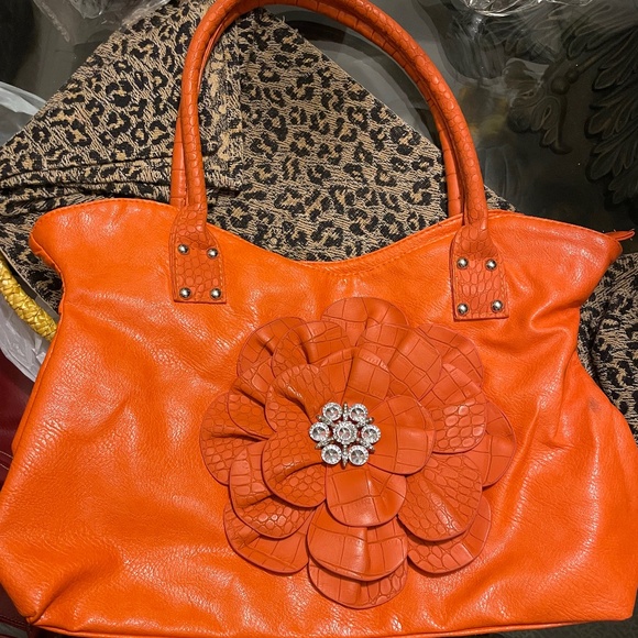 Handbags - Orange flower handbag with large rhinestones on center 
Please no bundles